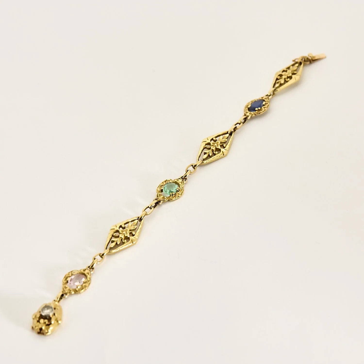 Bracelet en or jaune, saphir, topaze rose, émeraude et diamant sold by 58 Facettes product image thumbnail 4