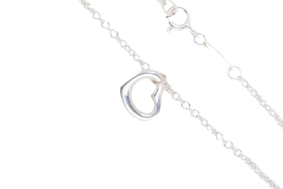 TIFFANY and CO. - Elsa Peretti - Bracelet cœur ouvert en argent sold by 58 Facettes