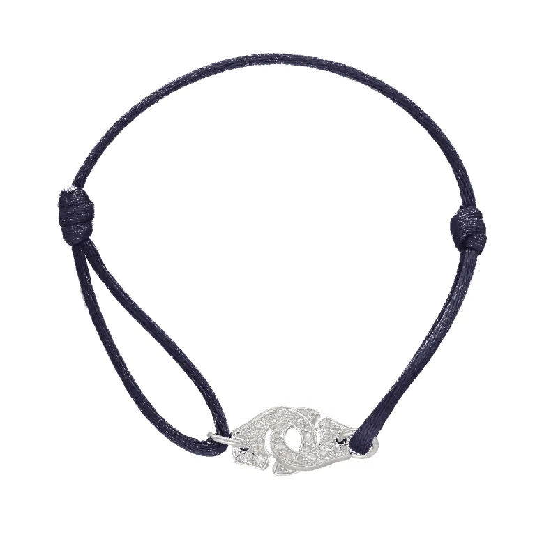 Bracelet Dinh Van Menottes R10 – Or gris 18k et diamants – Réf. 341122 – Vers 2010 sold by 58 Facettes