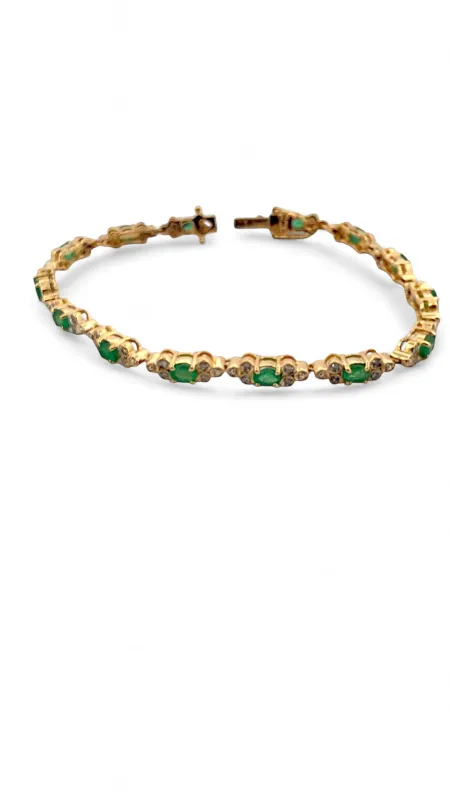 Bracelet en or jaune émeraudes et diamants sold by 58 Facettes