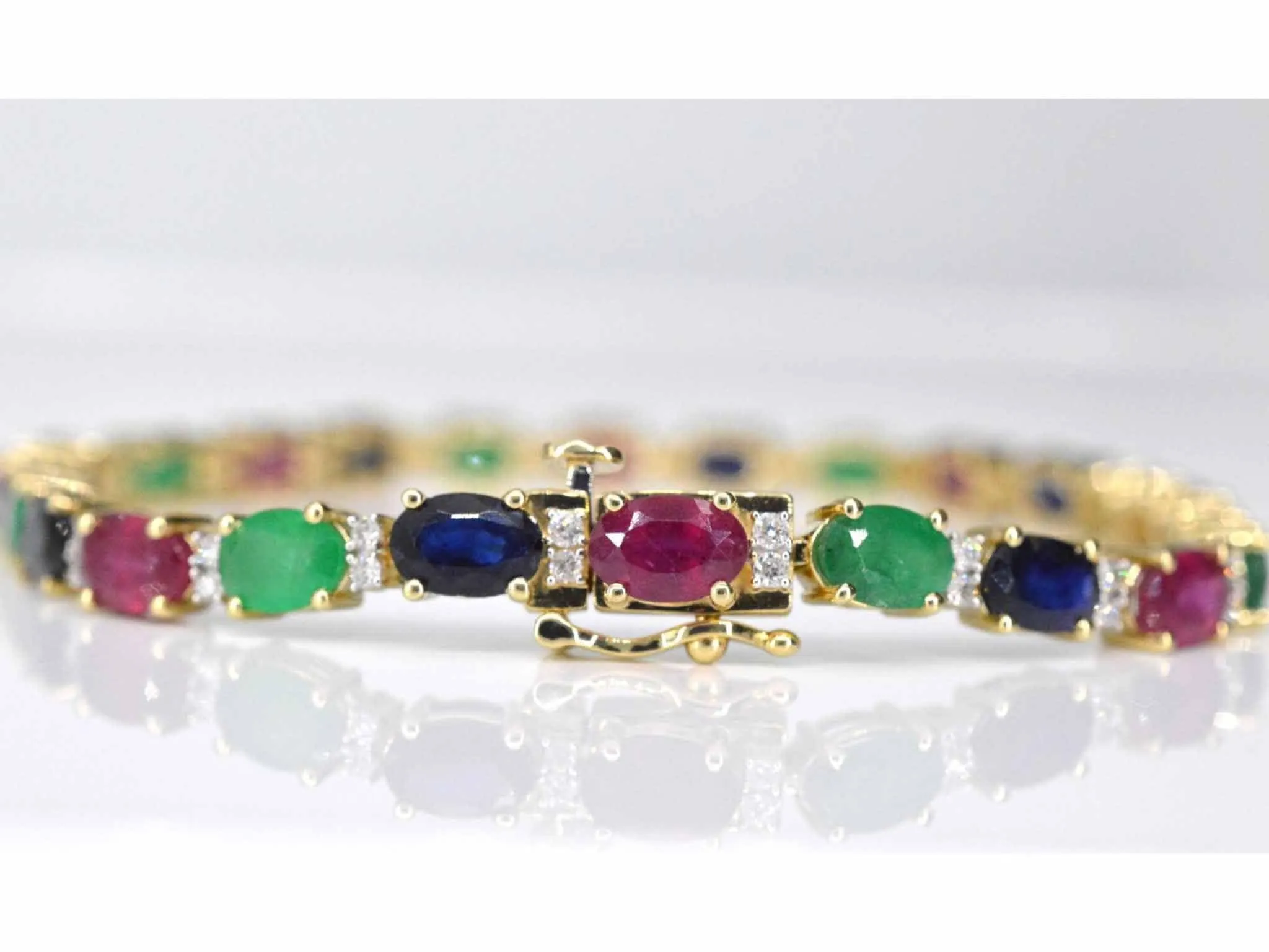 Bracelet tennis en or avec diamants, saphir, rubis et émeraude sold by 58 Facettes product image thumbnail 5