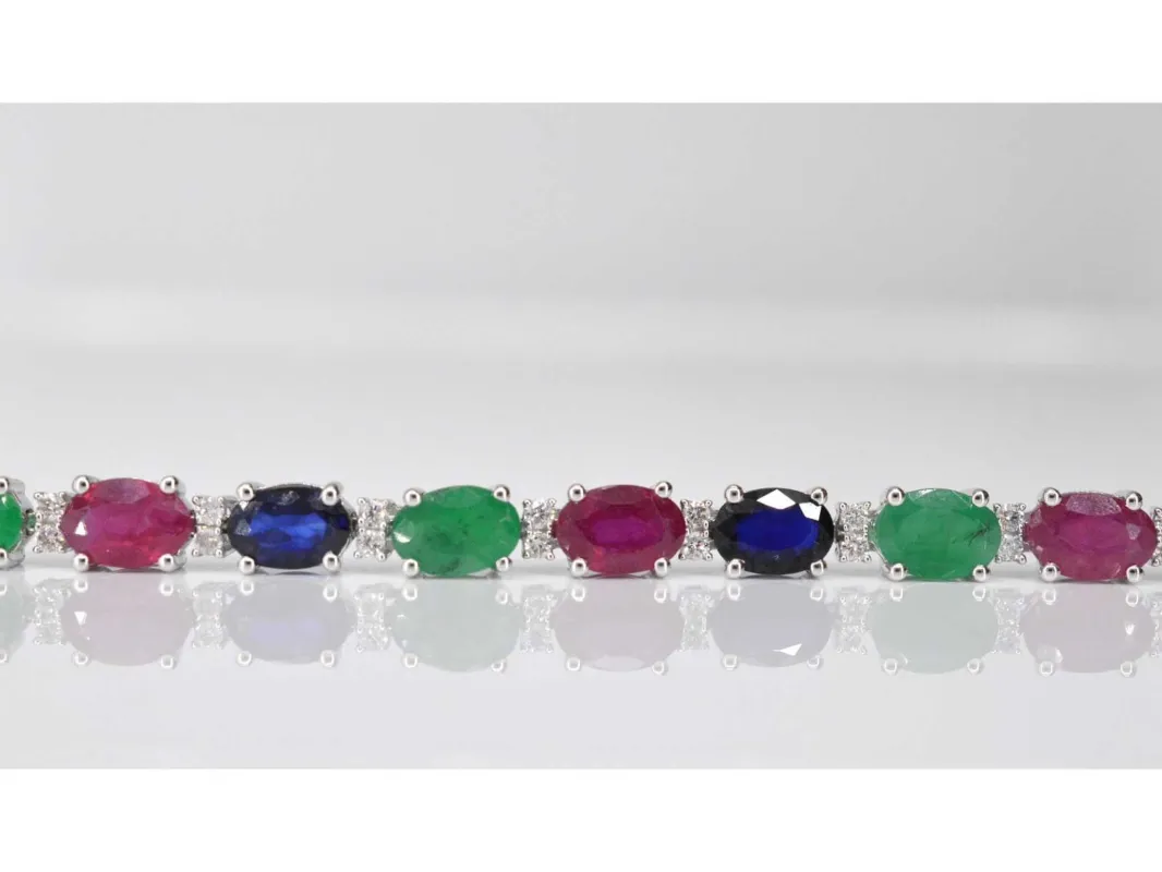 Bracelet tennis en or blanc avec diamants, saphir, rubis et émeraude sold by 58 Facettes