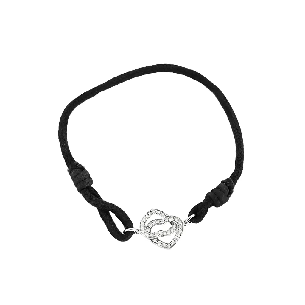 DINH VAN - Bracelet en cordon noir, or blanc et diamants sold by 58 Facettes
