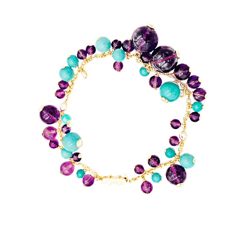 Bracelet CARTIER, modèle "Délices de Goa", or rose, améthyste, turquoises et diamants. made by 58 Facettes