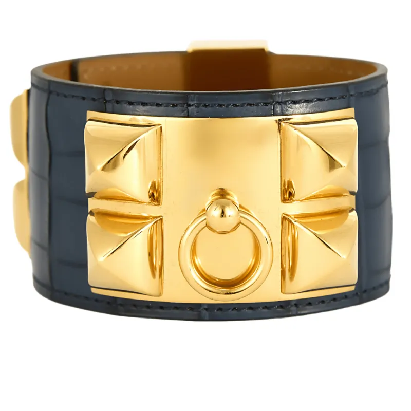 HERMES - Medor - Bracelet manchette en cuir et métal doré sold by 58 Facettes