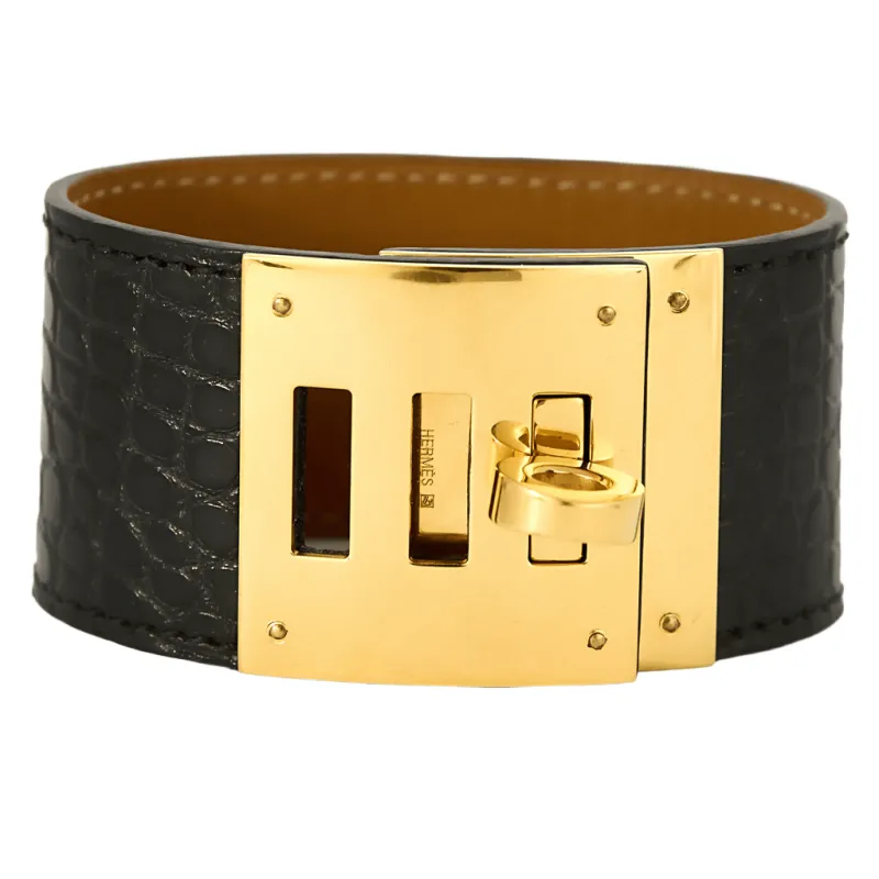 HERMES - Kelly Twist grand modèle - Bracelet manchette cuir et métal doré sold by 58 Facettes