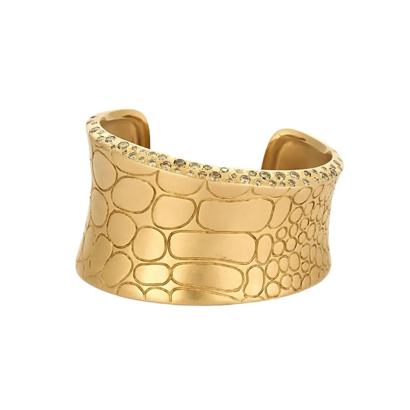 POMELLATO - Bracelet en or rose représentant des écailles de crocodile sertie de diamants sold by 58 Facettes