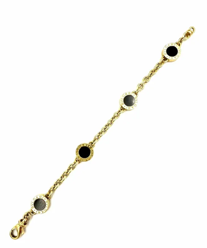 BVLGARI. Collection "BVLGARI-BVLGARI", bracelet or jaune et onyx sold by 58 Facettes