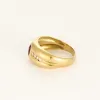 Bague bandeau en or jaune, rubis et diamants sold by 58 Facettes