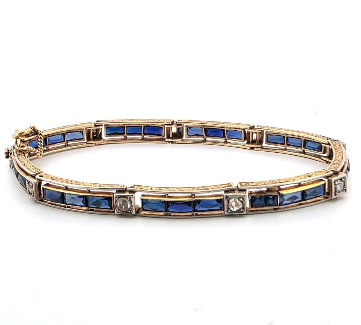 Bracelet en or jaune avec diamants et saphirs sold by 58 Facettes