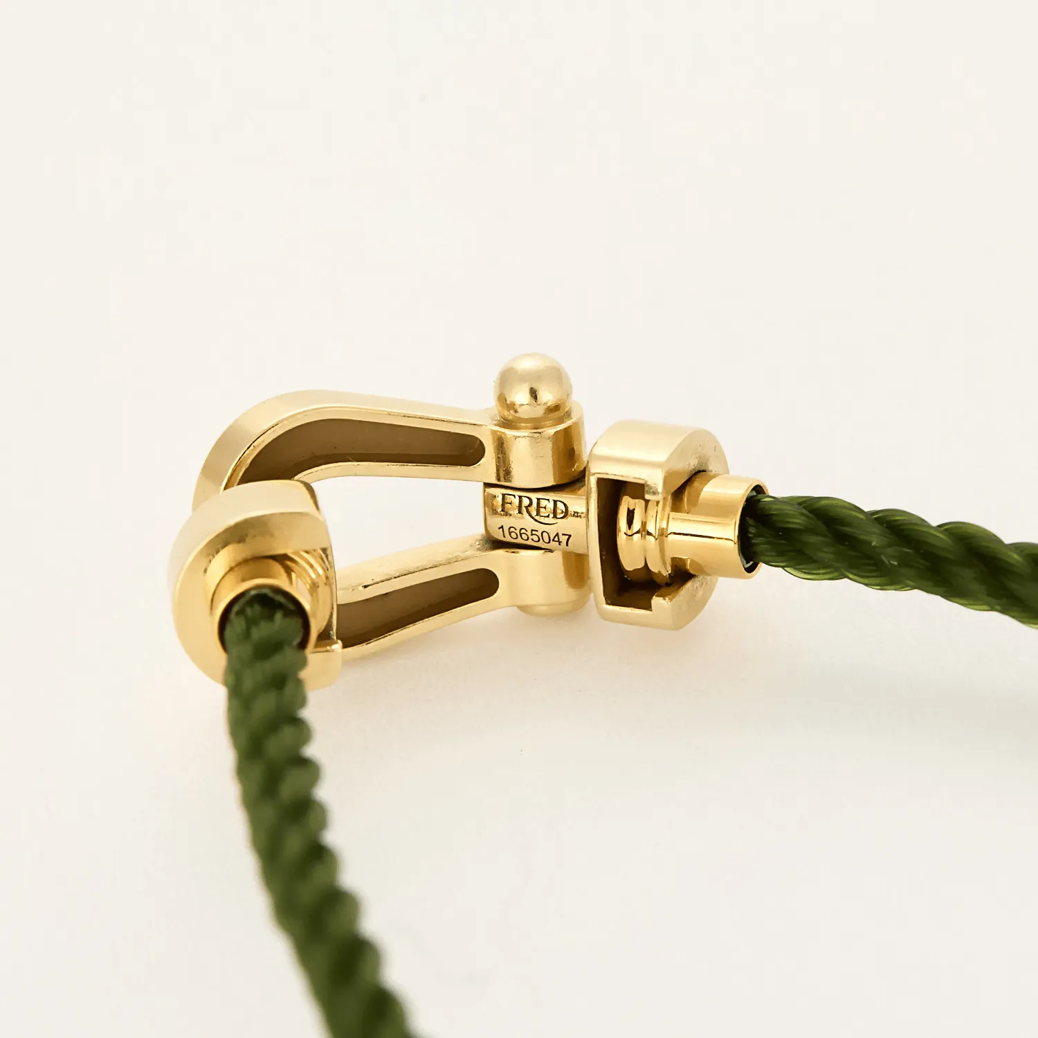 FRED - FORCE 10 - Moyen modèle - Bracelet en or jaune et cordon torsadé en acier vert sold by 58 Facettes product image thumbnail 4