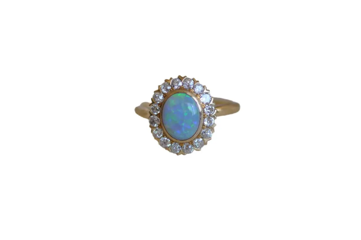 Yellow gold Australian opal and diamond ring sold by 58 Facettes