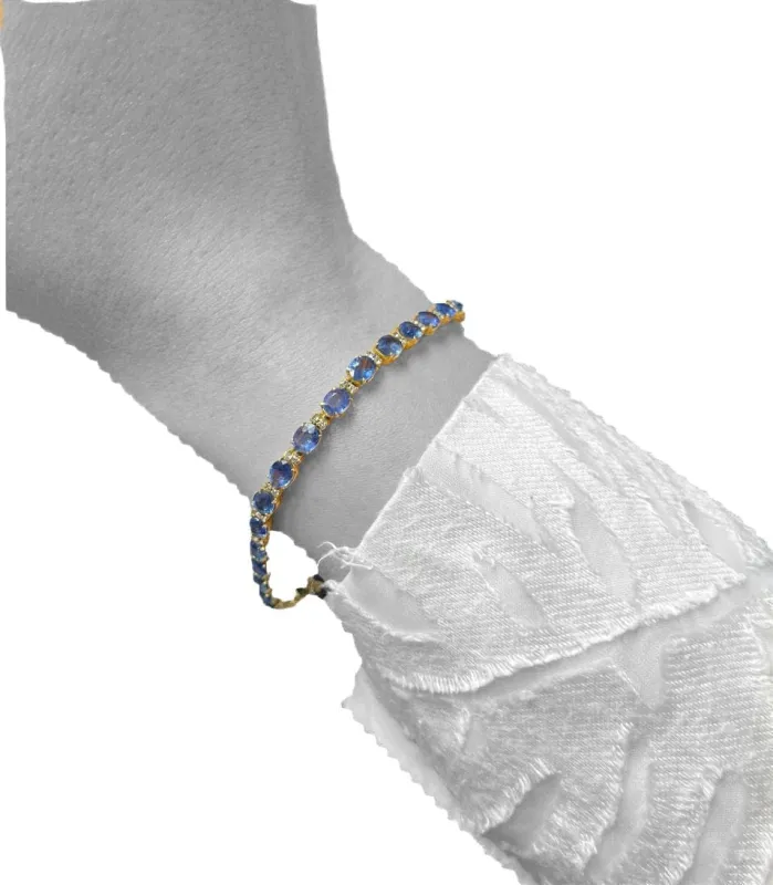 Bracelet tennis en or jaune avec saphirs et diamants sold by 58 Facettes