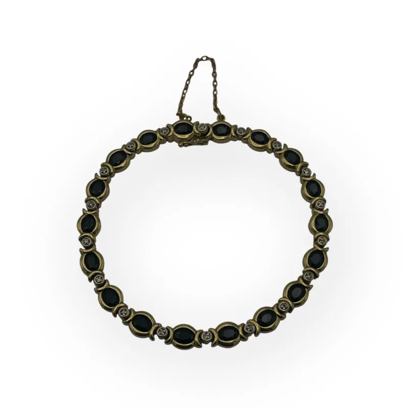 Bracelet or jaune, saphirs et diamants sold by 58 Facettes