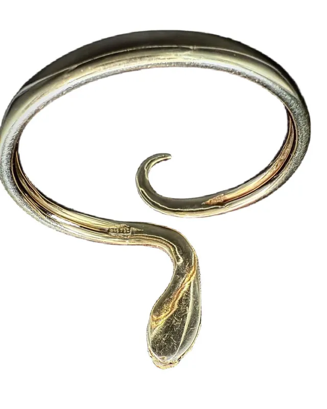 Bracelet esclave en forme de serpent, or jaune diamants brillants et rubis sold by 58 Facettes