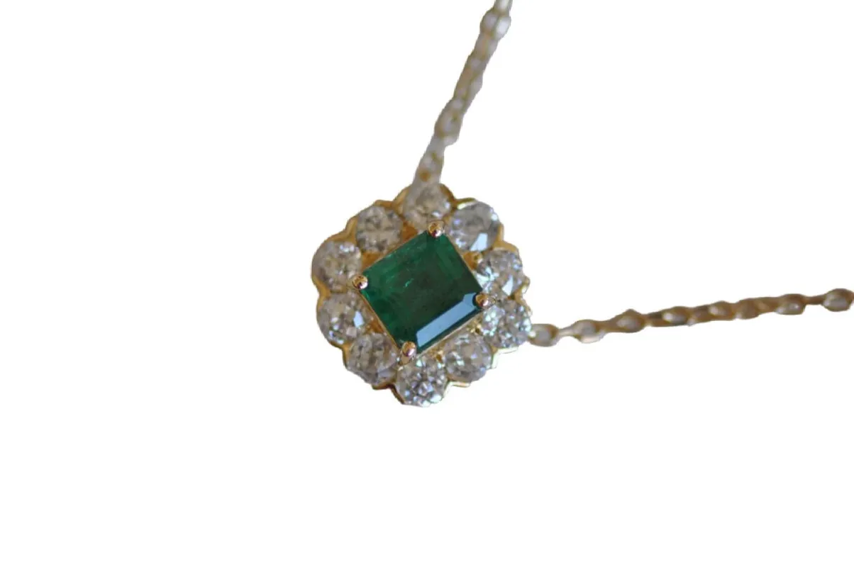 Vintage yellow gold emerald diamond pendant sold by 58 Facettes