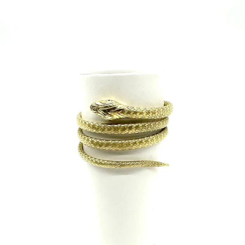 Bracelet volume serpent or jaune et saphirs sold by 58 Facettes