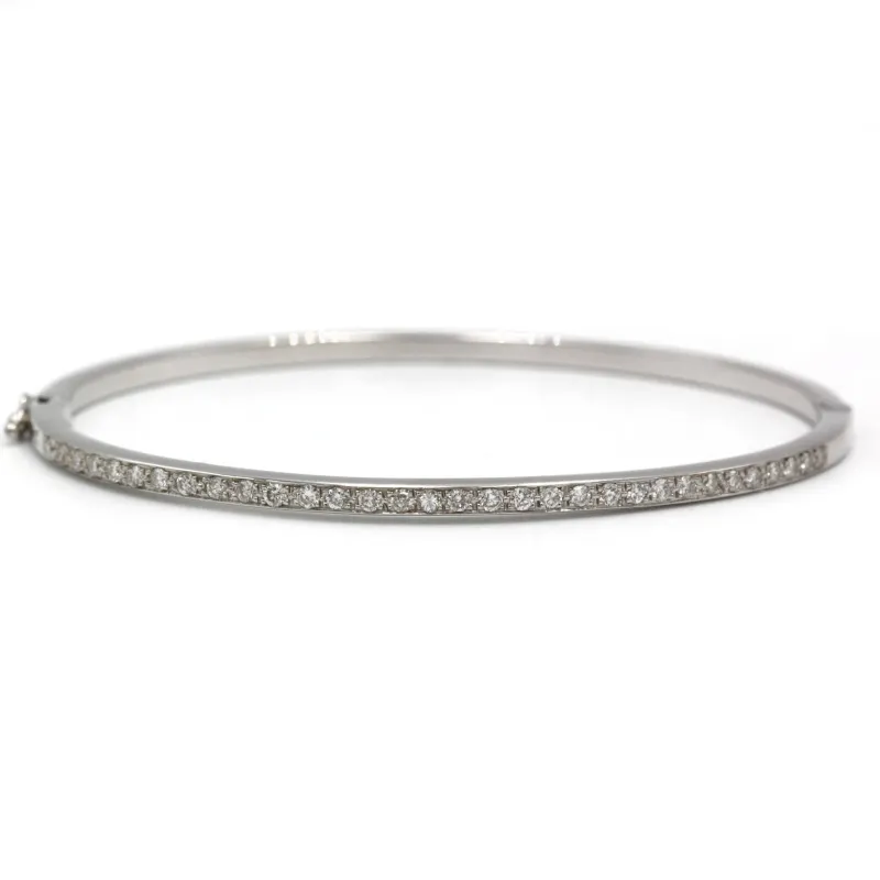 Bracelet rigide en or blanc 750 et diamants environ 1 carat total sold by 58 Facettes