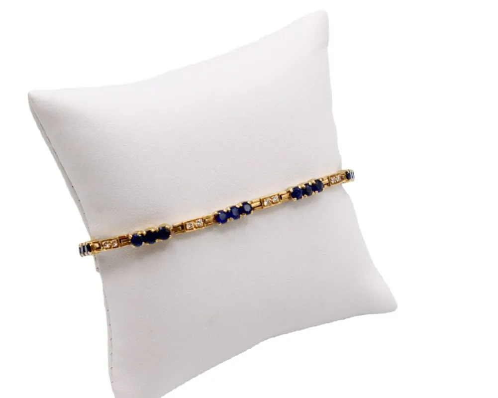 Bracelet rivière de diamants et de saphirs, or jaune sold by 58 Facettes