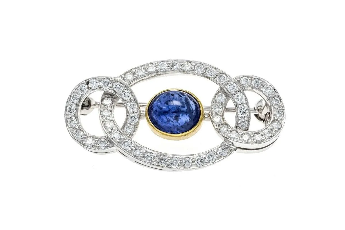 Broche Art Déco en or blanc avec saphir et diamants sold by 58 Facettes