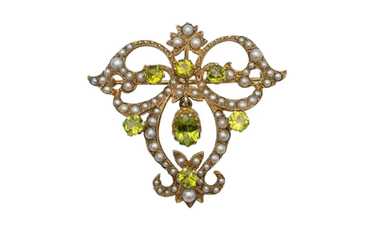 Broche pendentif édouardienne avec péridot et perles, début du XXe siècle sold by 58 Facettes
