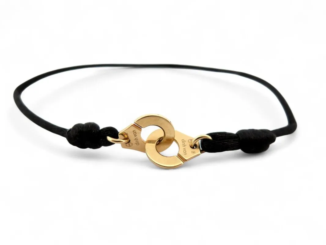 bracelet DINH VAN menottes r10 341102 en or jaune 18k 2.9gr & cordon noir sold by 58 Facettes
