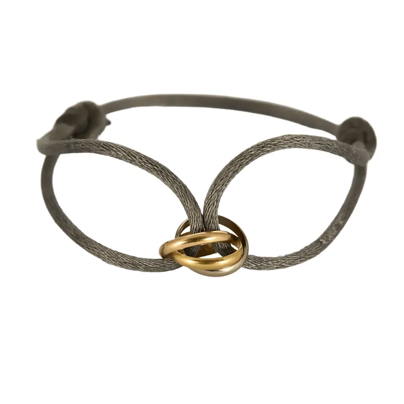 CARTIER - TRinity - Bracelet cordon et pendentif trois ors sold by 58 Facettes