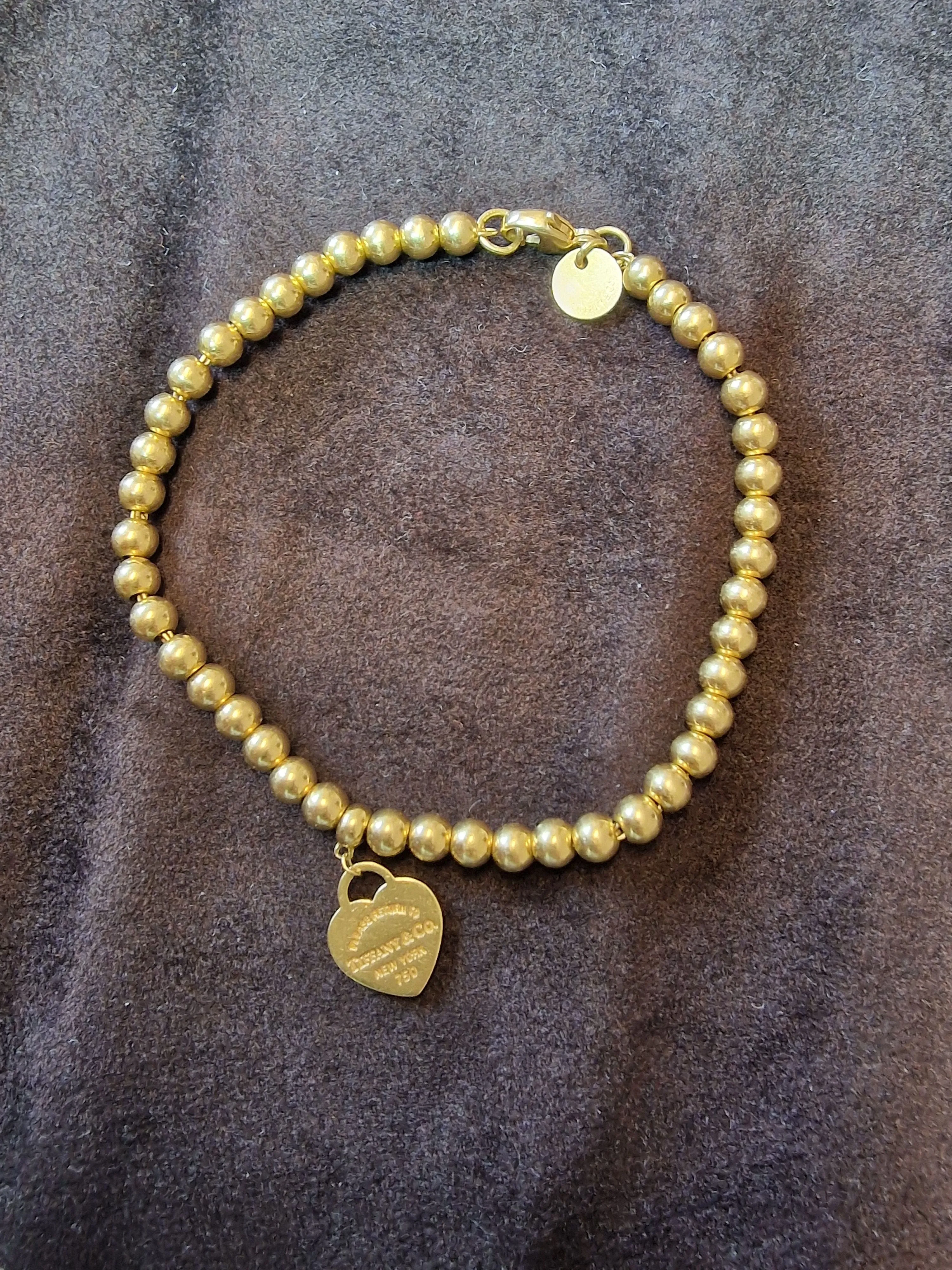 Tiffany&Co - Bracelet de perles Heart Tag en or jaune sold by 58 Facettes product image thumbnail 5