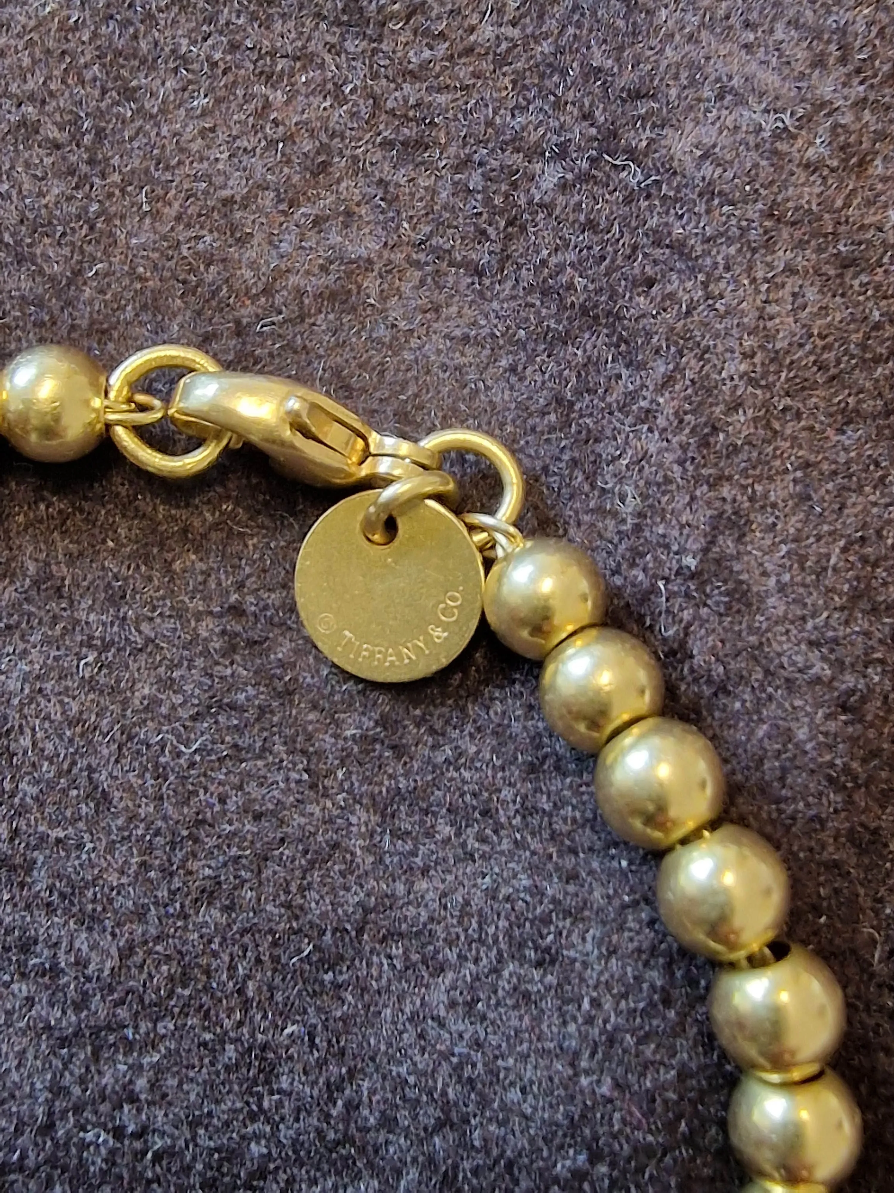 Tiffany&Co - Bracelet de perles Heart Tag en or jaune sold by 58 Facettes product image thumbnail 2