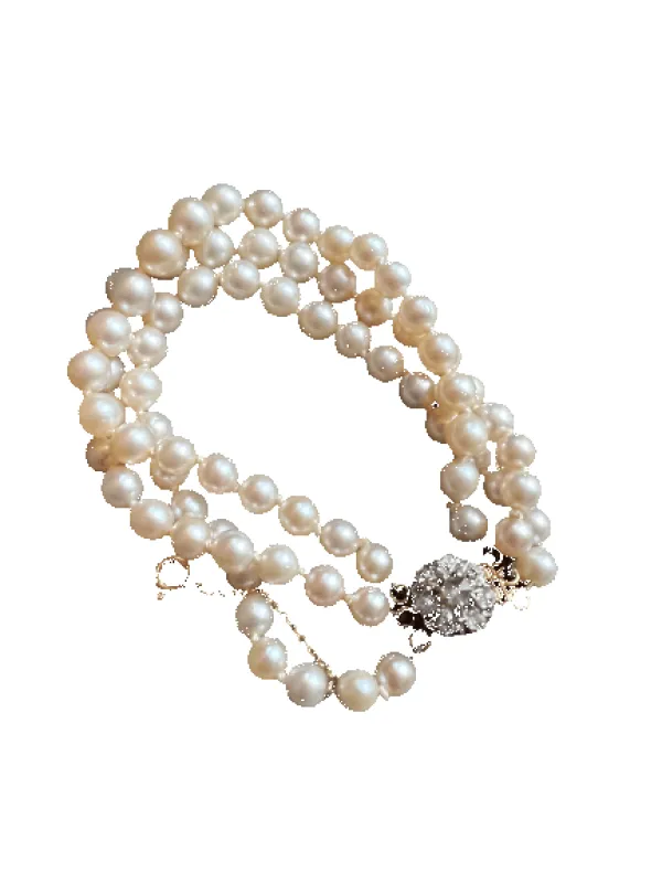 Bracelet 3 rangs de perles de culture monture en or 18k et diamants 16,5 cm art déco sold by 58 Facettes