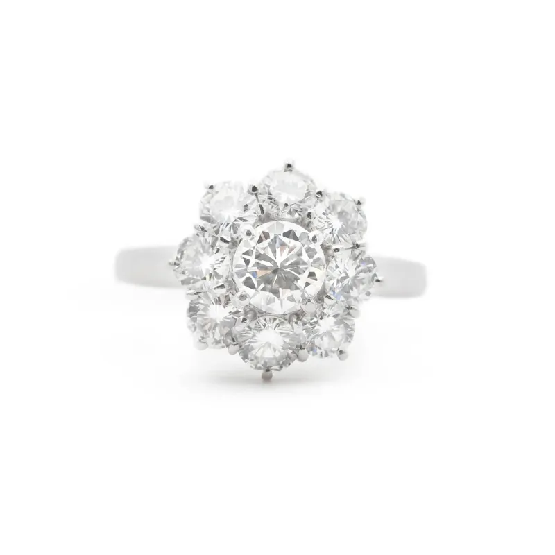 Bague en or blanc avec un diamant central de 0,58 ct et des diamants d'accompagnement sold by 58 Facettes