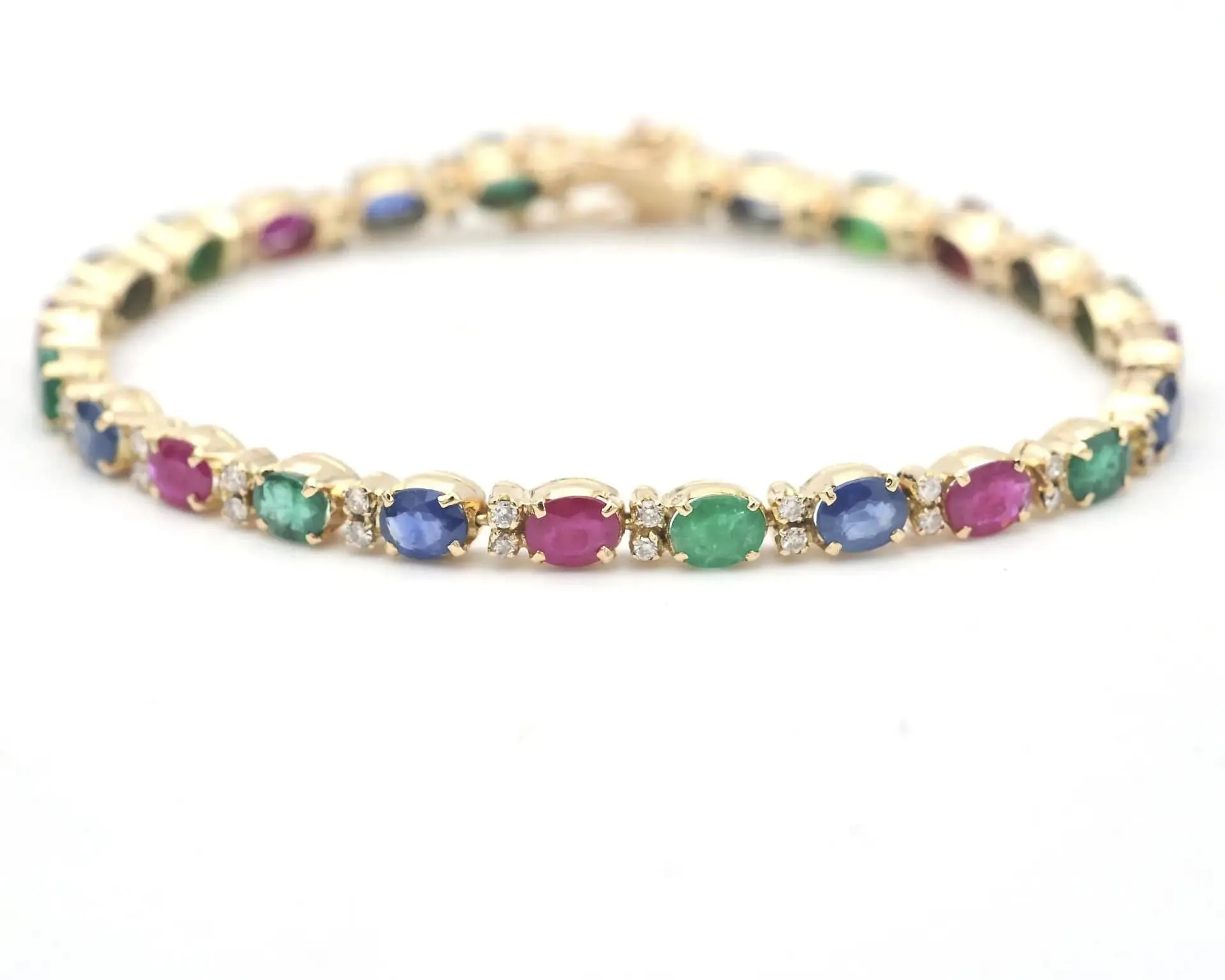 Bracelet en or jaune orné de pierres précieuses sold by 58 Facettes