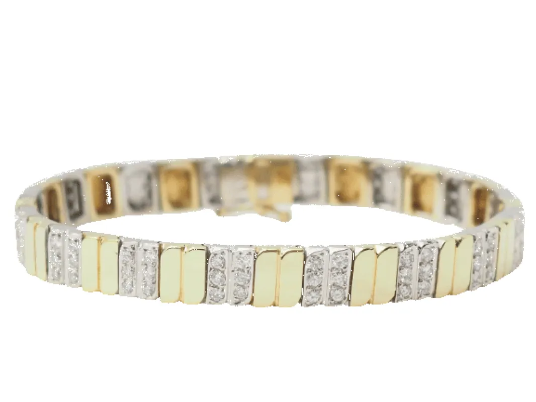 Bracelet semi-rigide vintage en or jaune et blanc 18 ct et diamants sold by 58 Facettes