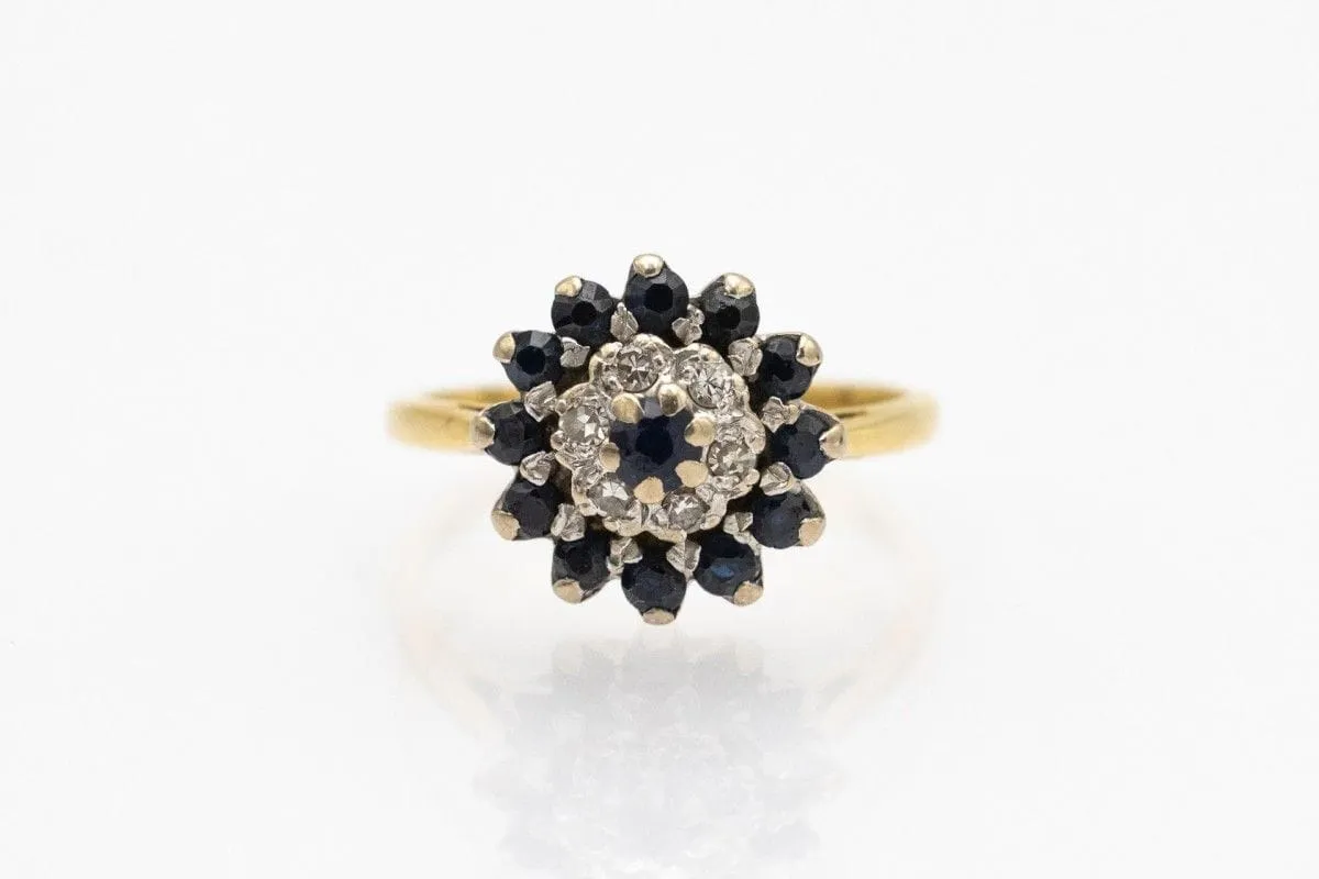 Yellow gold ring with diamonds and sapphires sold by 58 Facettes