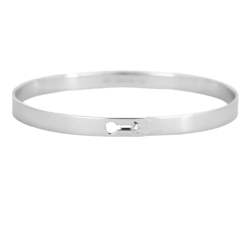 Dinh Van - Serrure -Bracelet en or gris et diamant sold by 58 Facettes