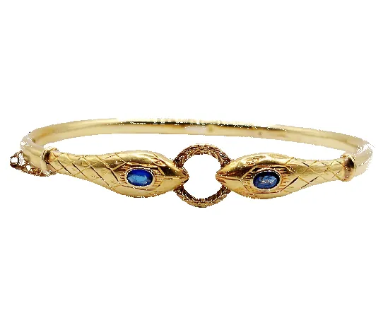 Bracelet serpent à deux têtes or jaune et pierre bleues (circa 1920) sold by 58 Facettes