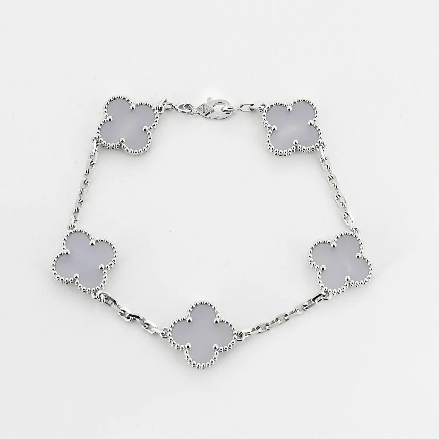 Van Cleef &Arpels -Vintage Alhambra- Bracelet en or gris et calcédoine sold by 58 Facettes