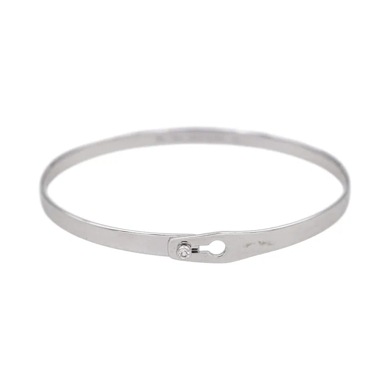 Dinh Van Serrure - Bracelet jonc ouvrant en or blanc et diamant sold by 58 Facettes