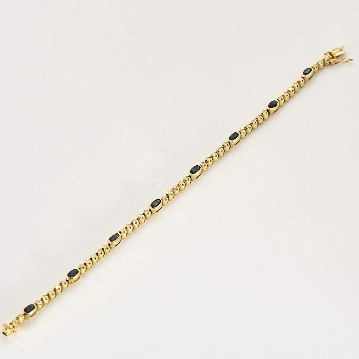 Bracelet articulé en or jaune 18k et diamants, saphirs sold by 58 Facettes product image thumbnail 3