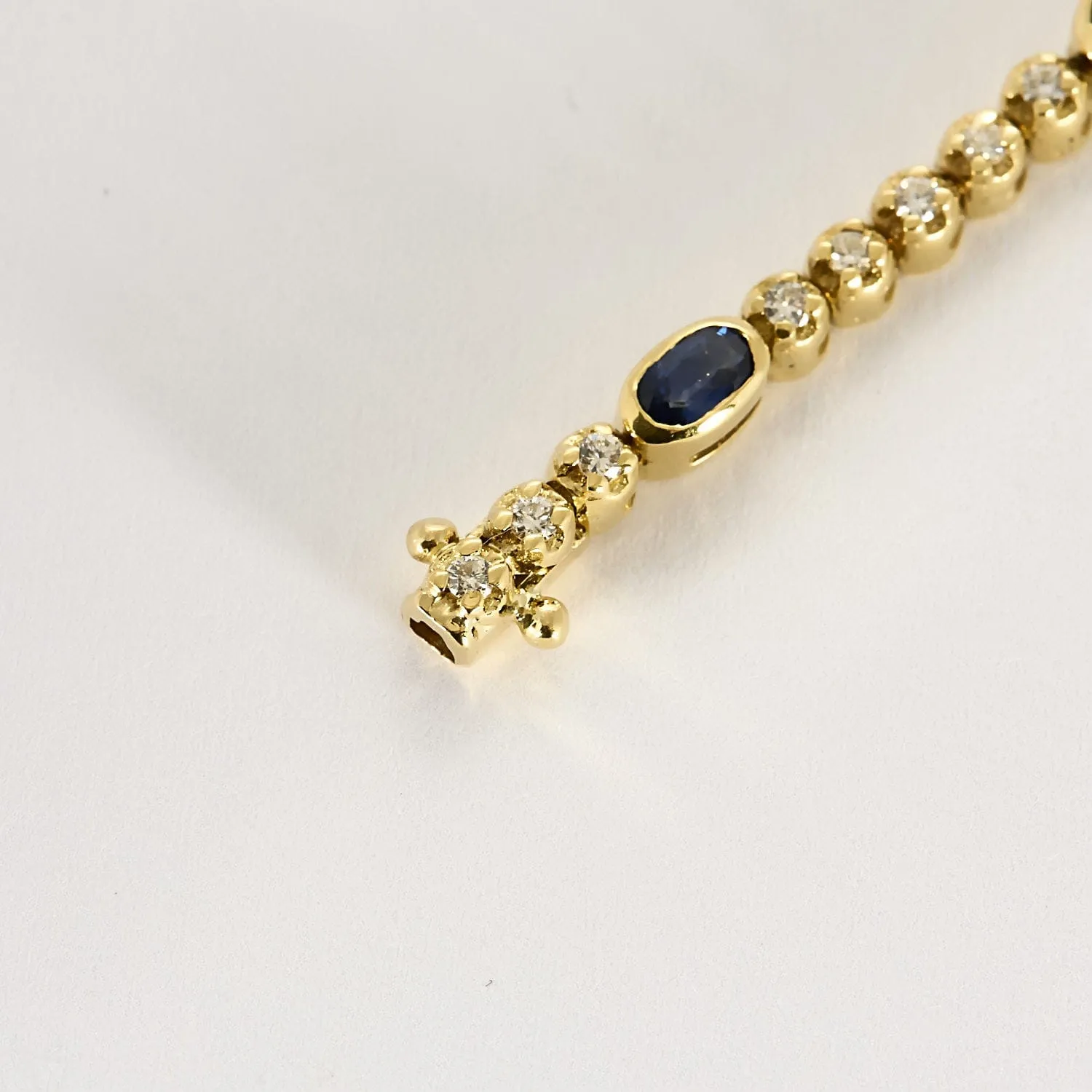 Bracelet articulé en or jaune 18k et diamants, saphirs sold by 58 Facettes product image thumbnail 4