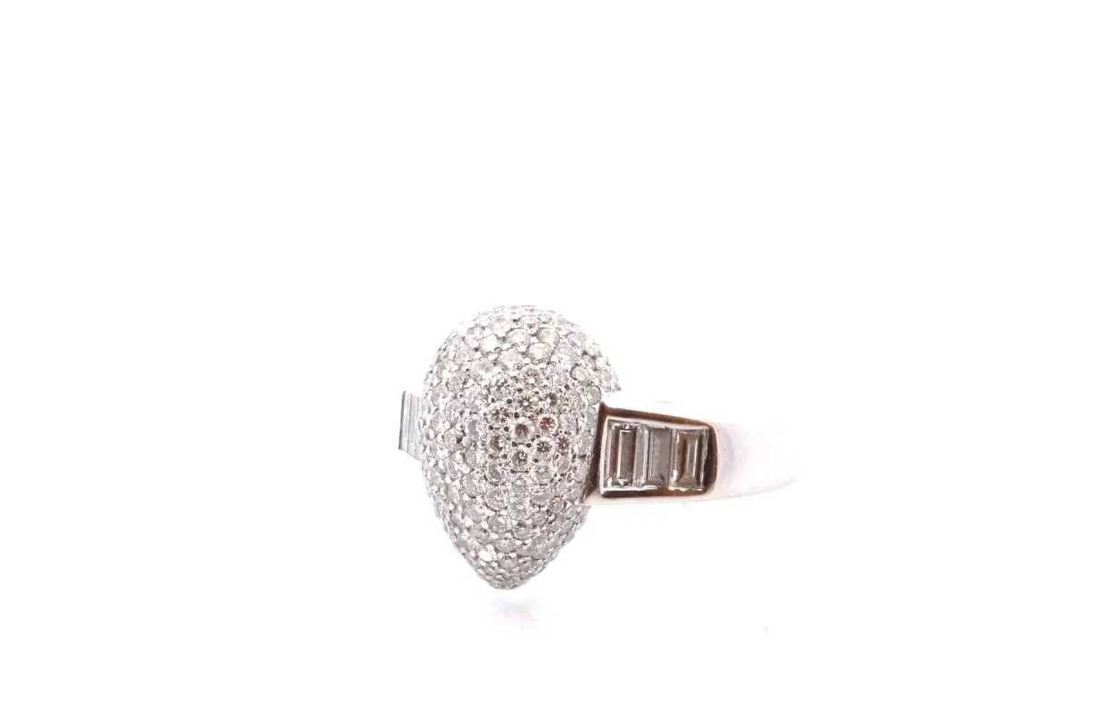 Bague en or 18k et diamants taille brillant et baguette sold by 58 Facettes