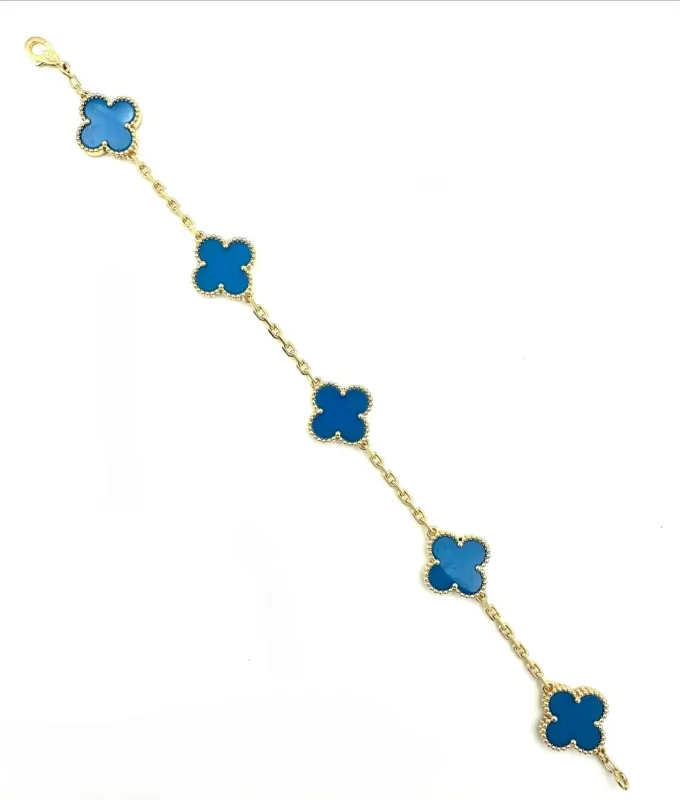 VAN CLEEF & ARPELS. Collection "Alhambra vintage", bracelet or jaune et agate sold by 58 Facettes