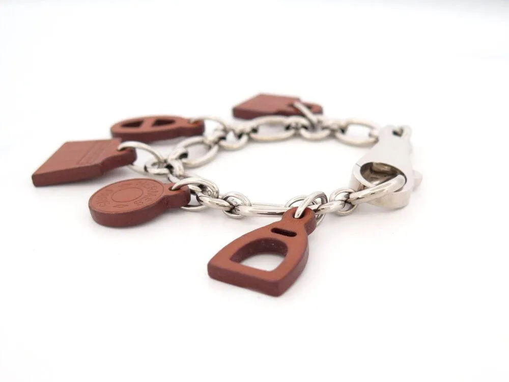 bracelet HERMES olga amulette a01032 18 cuir barenia acier sold by 58 Facettes product image thumbnail 5