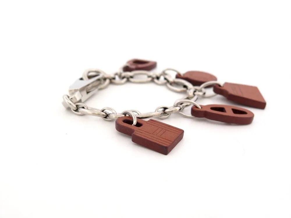 bracelet HERMES olga amulette a01032 18 cuir barenia acier sold by 58 Facettes product image thumbnail 3