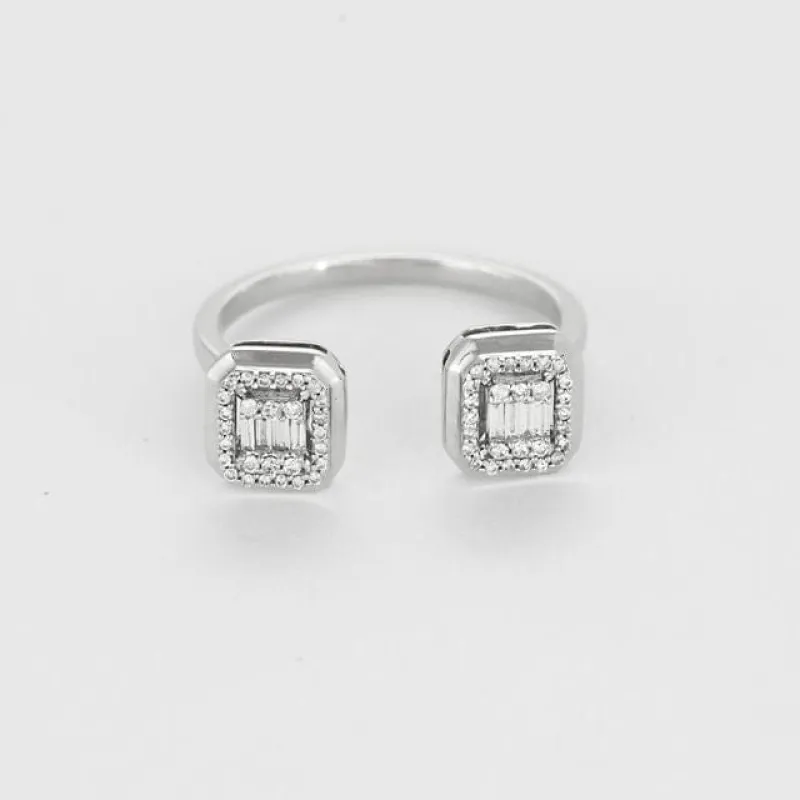 Bague en or blanc 18 carats sertie de deux diamants baguettes made by 58 Facettes