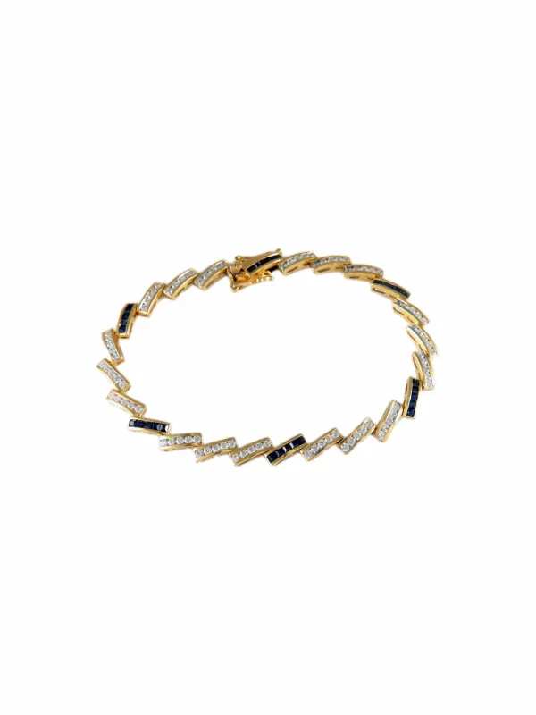 Bracelet serti en or jaune 18 carats, saphirs et diamants made by 58 Facettes