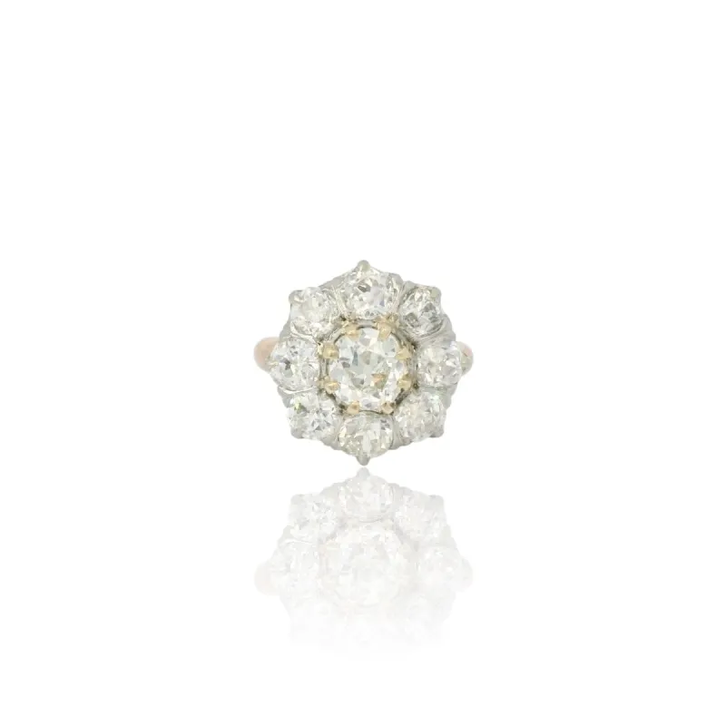 Bague cluster en or blanc et jaune 18k et diamants sold by 58 Facettes