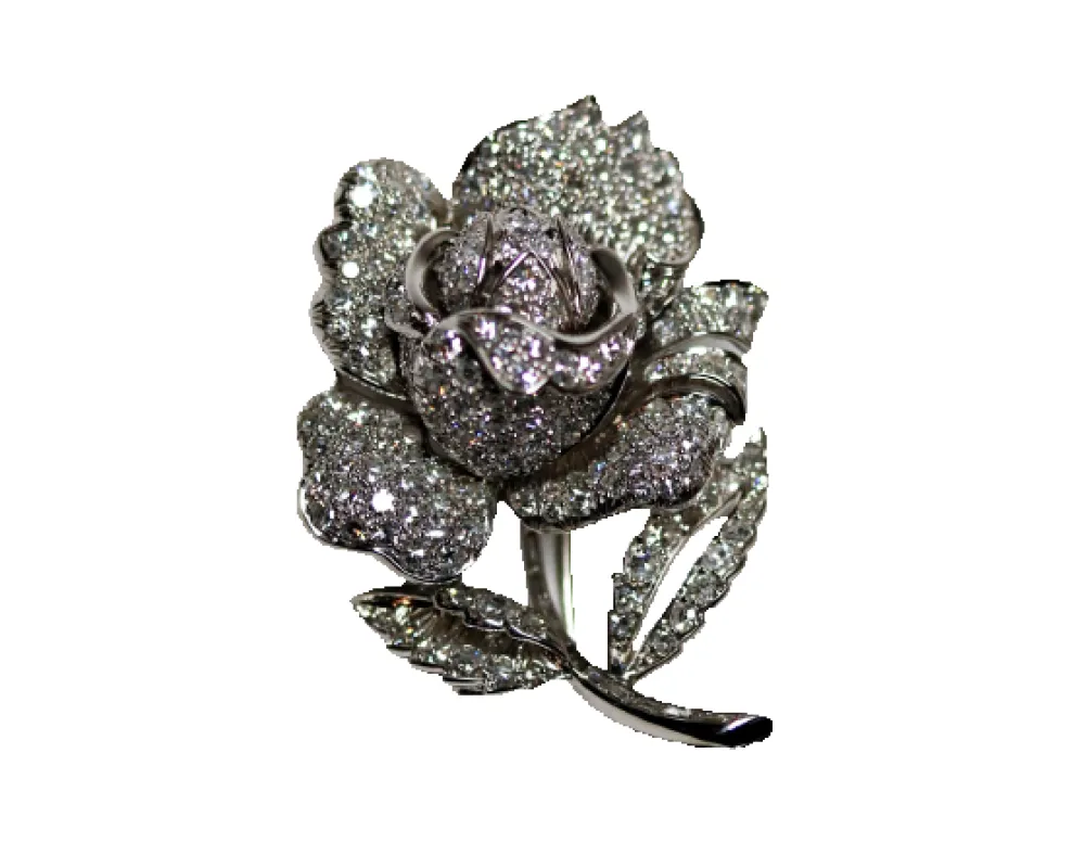 Broche rose pavée de diamants en or blanc et platine sold by 58 Facettes