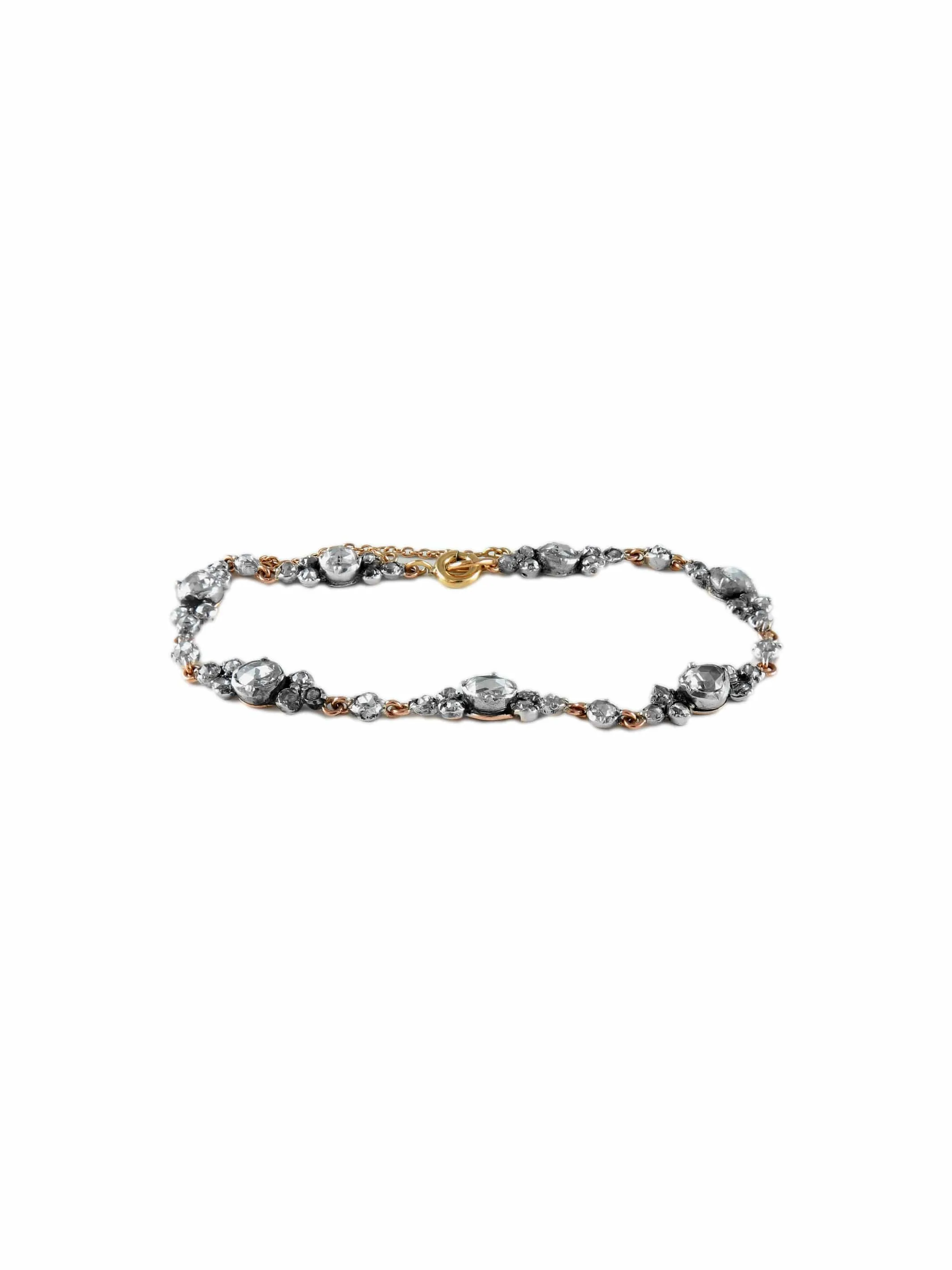 Bracelet ancien articulé en or jaune 18k, argent et diamants sold by 58 Facettes