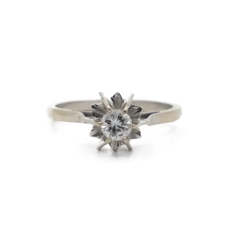 Bague solitaire en or gris rosé 18k et diamant 0,35 ct made by 58 Facettes